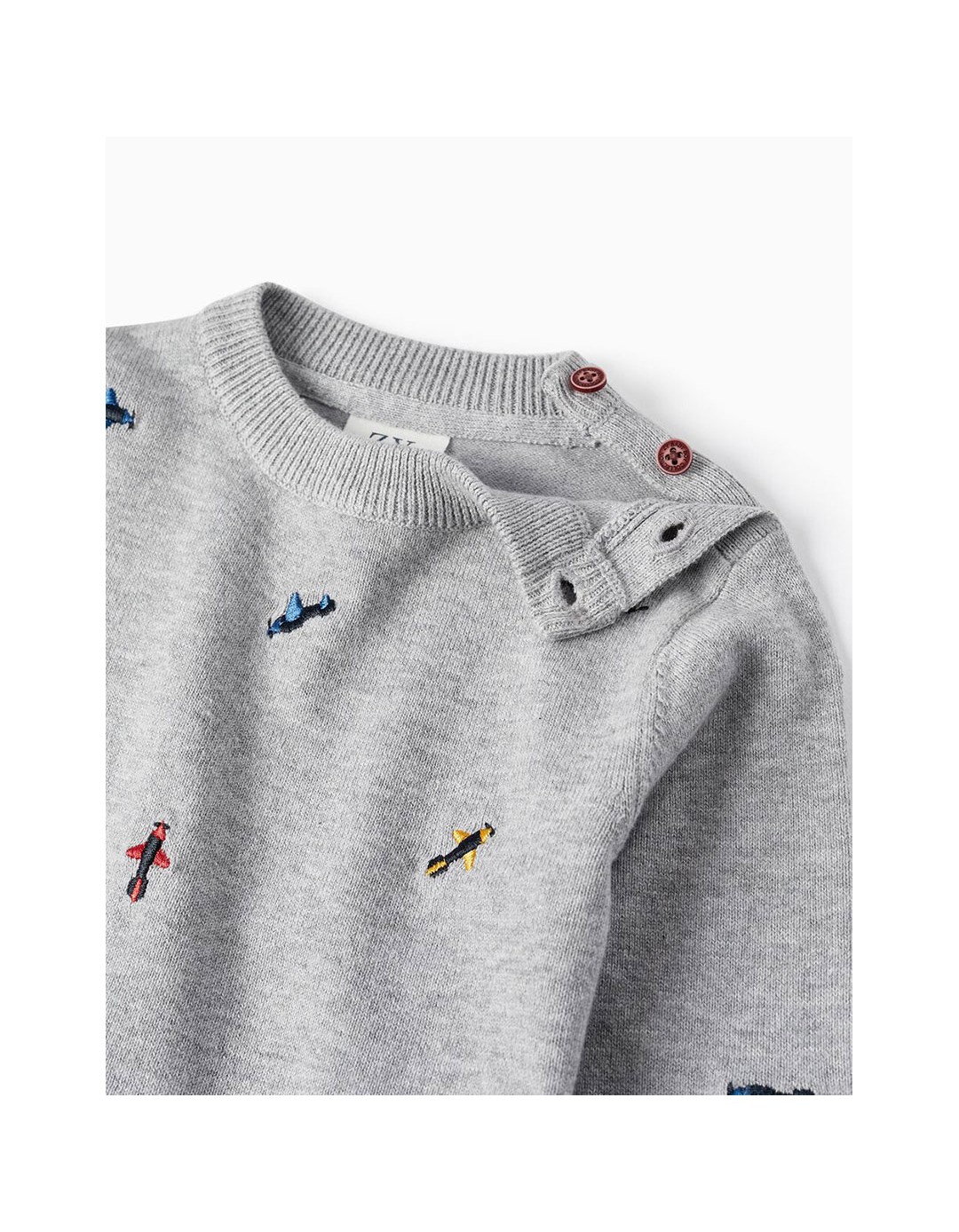 Πλεκτό παιδικό πουλόβερ για αγόρι σε γκρι χρώμα με σχέδια αεροπλανάκια 